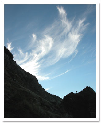 Cliff, Man and Sky